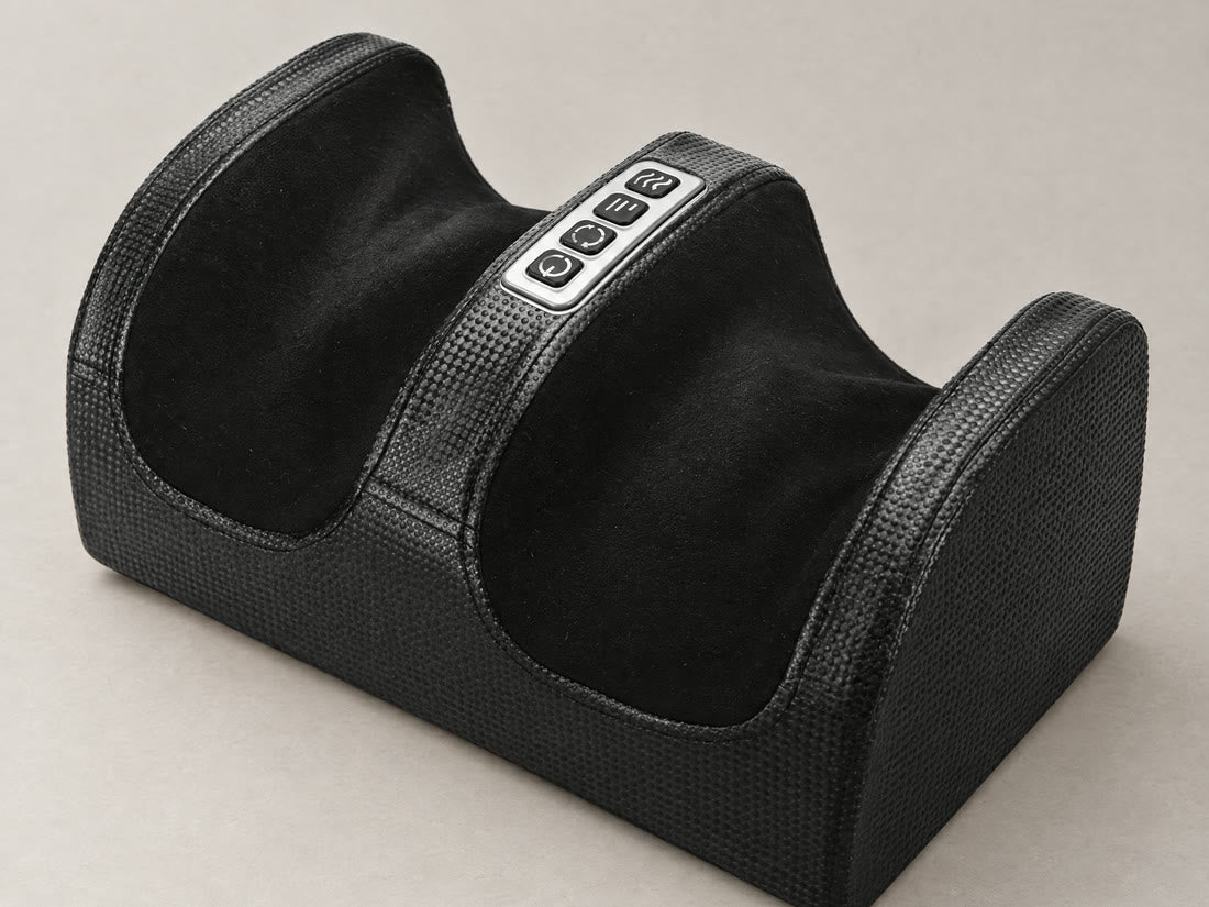 The black Shiatsu Foot and Calf Massager with its four-button control strip